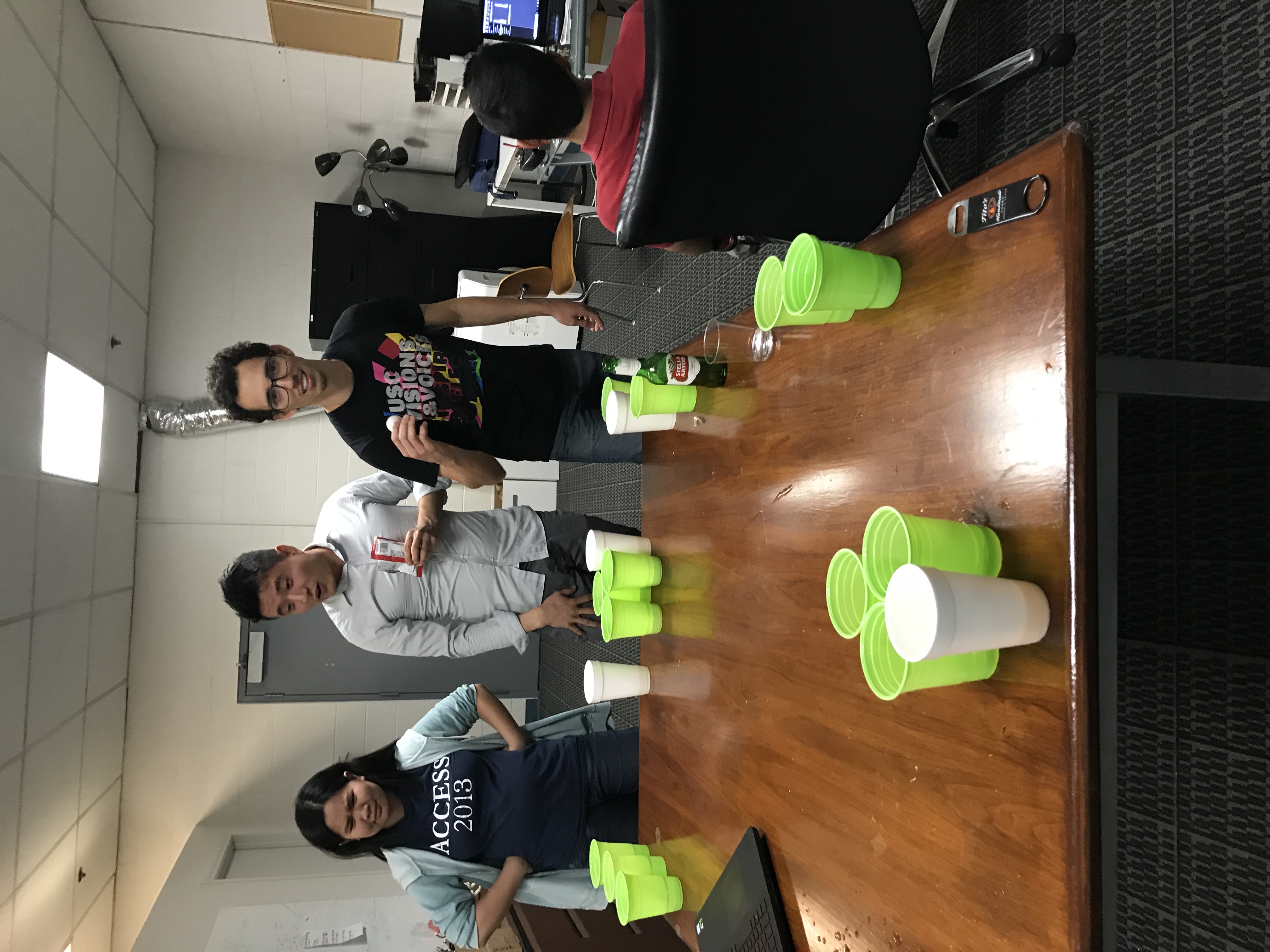 Startup team gathered informally around a table in the office.