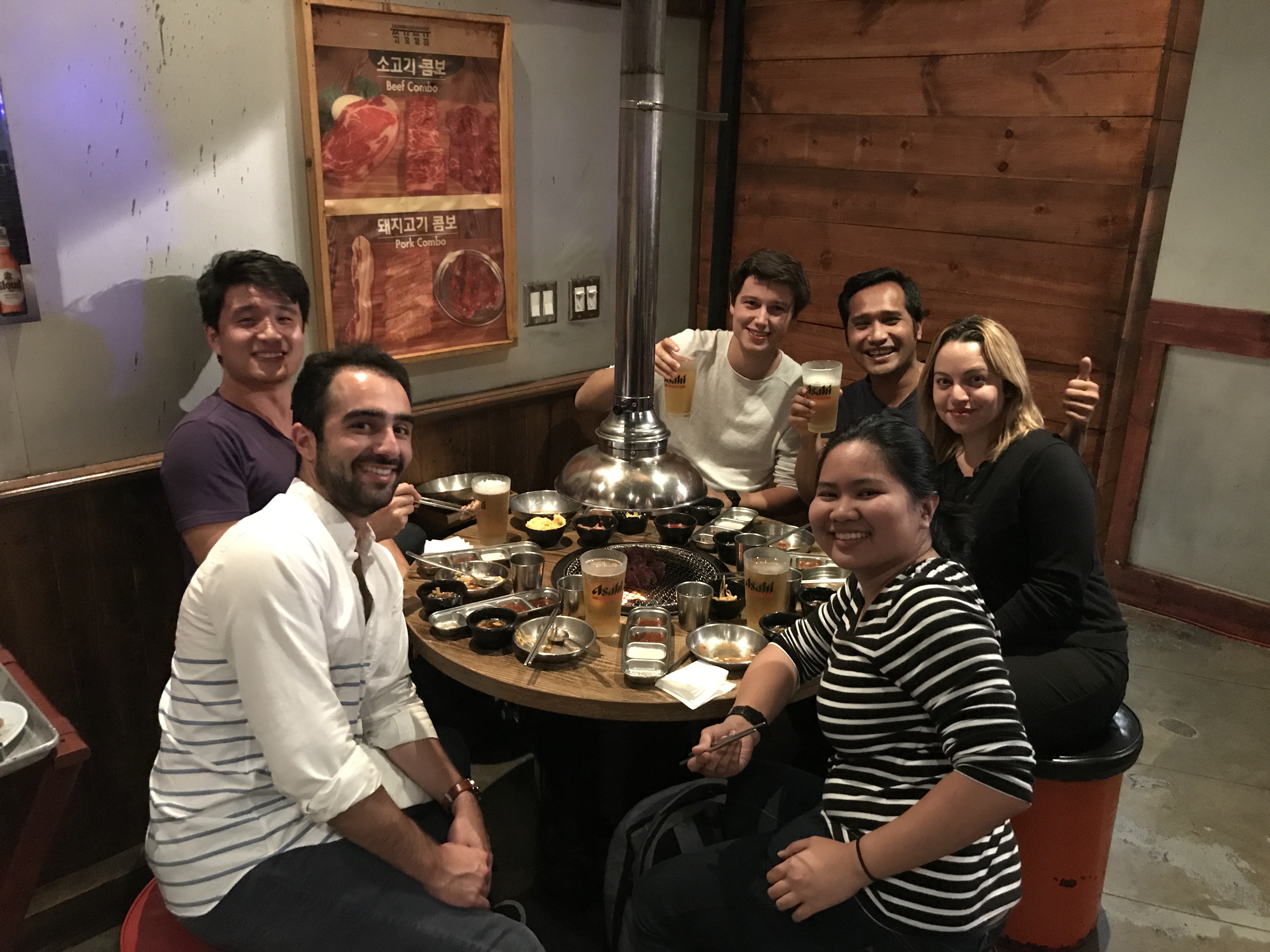Startup team gathered around a table for dinner.